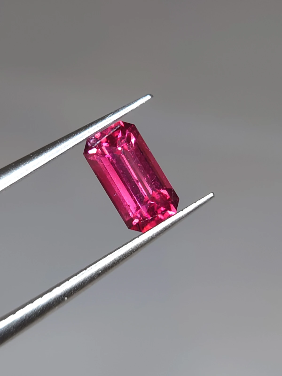 1.25ct Natural Malaya Garnet Emerald Cut Faceted Loose Gemstone from Tanzania — view 1