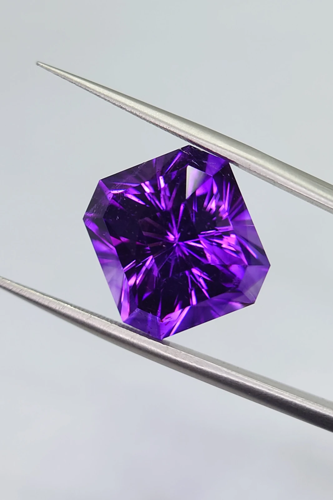 12.25ct Natural Bluish Purple Radiant Cut Amethyst from Nigeria — view 4