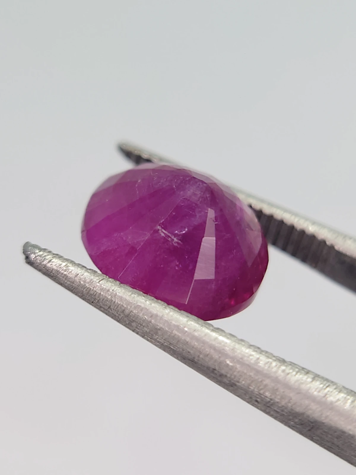 4.27ct Pinkish Purple Natural Oval Faceted Ruby from Afghanistan — view 5