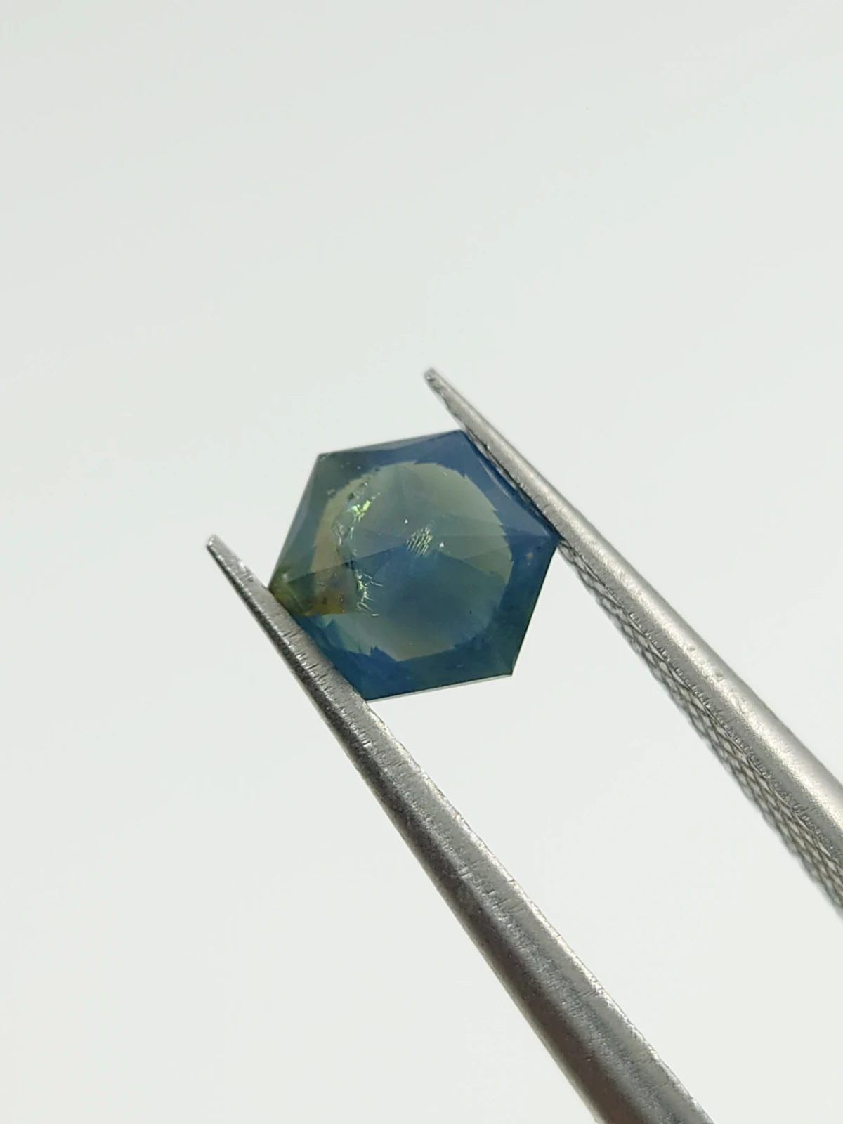 0.9ct Natural Opalescent Blue Sapphire Hexagonal Cut From Nigeria — view 1