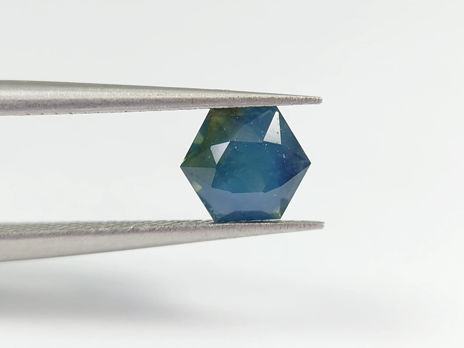 0.9ct Natural Opalescent Blue Sapphire Hexagonal Cut From Nigeria — view 7