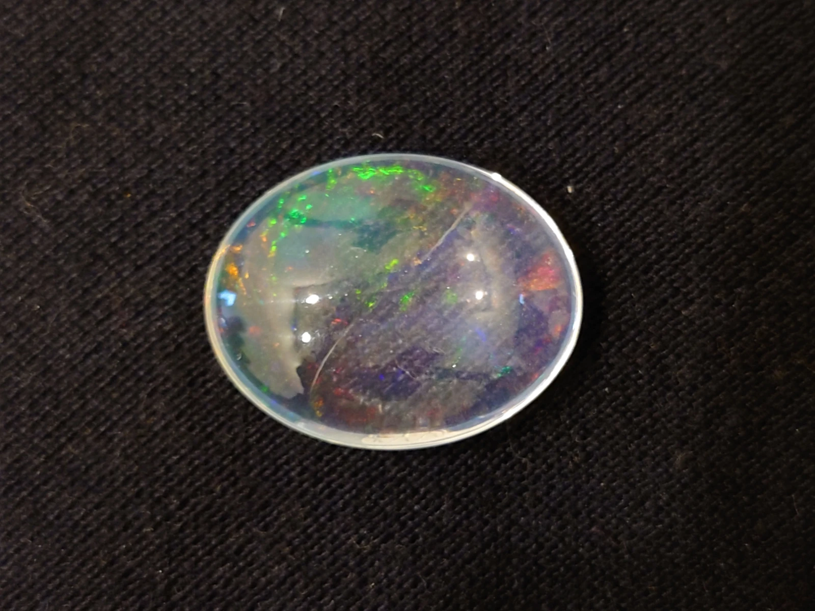 17.44ct Natural White Crystal Rainbow Cab Cut From Ethiopia — view 1