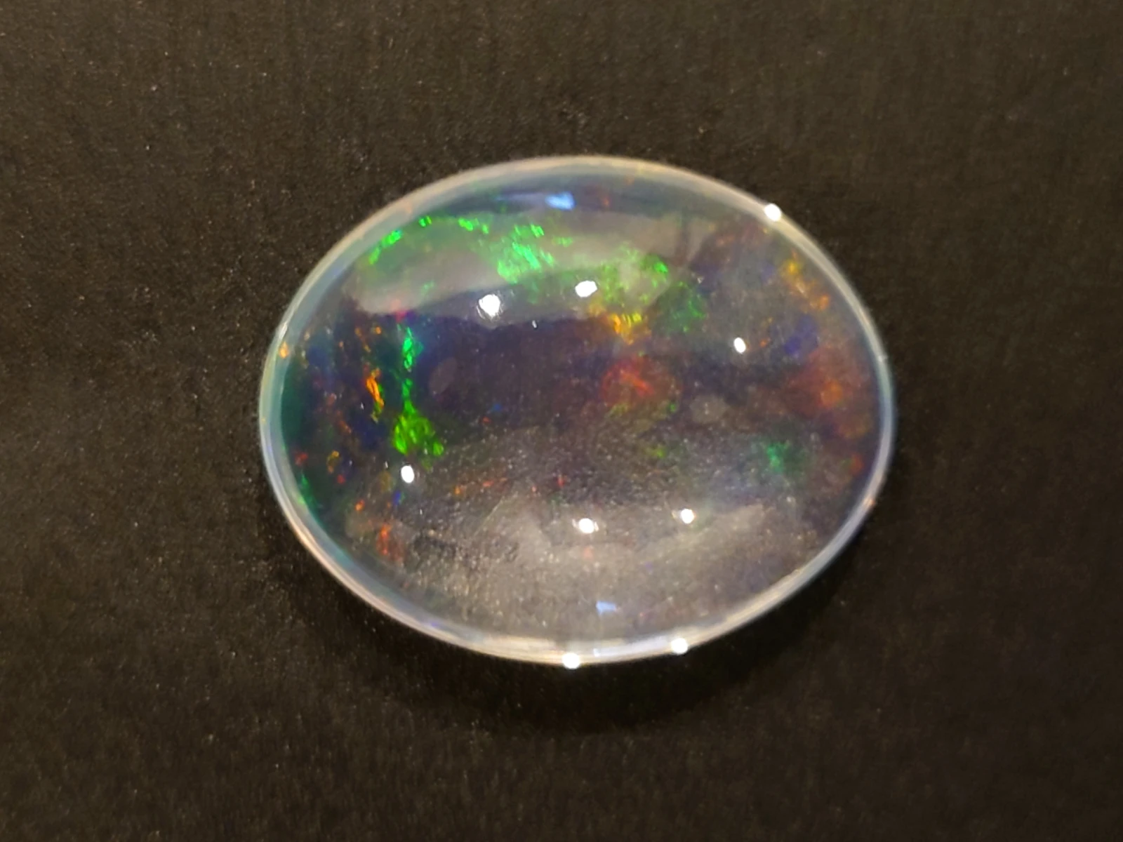 17.44ct Natural White Crystal Rainbow Cab Cut From Ethiopia — view 4