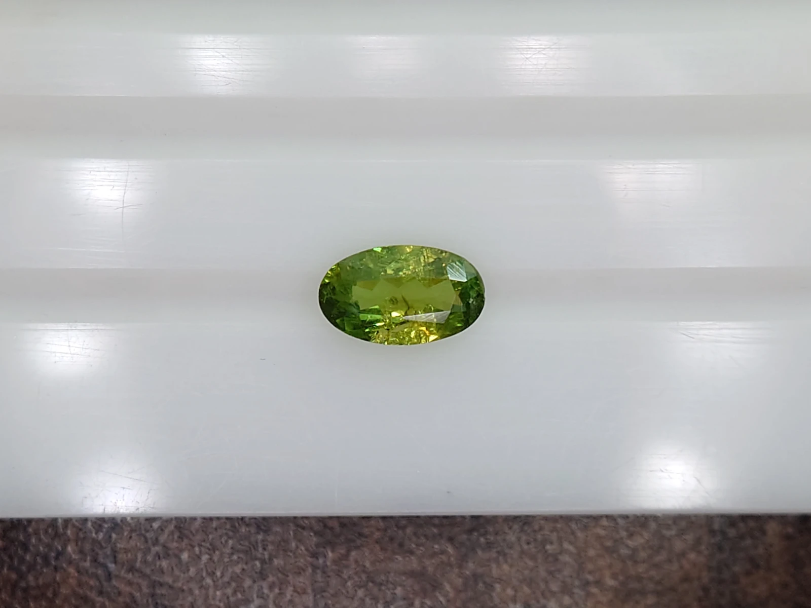 0.68ct Natural Oval cut Demantoid Garnet from Madagascar — view 2