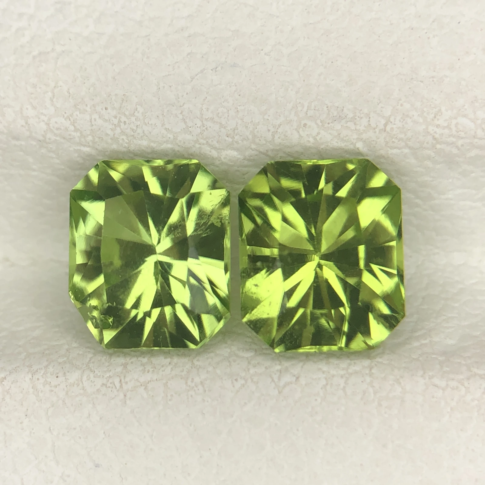 2.55 ct Natural Peridot loose gemstone pair fancy octagon cut — view 1