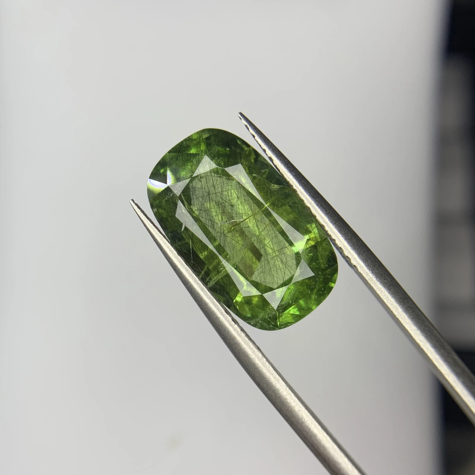 8.40ct Natural Peridot with Ludwigite Inclusion in Cushion Shape from Pakistan — view 1