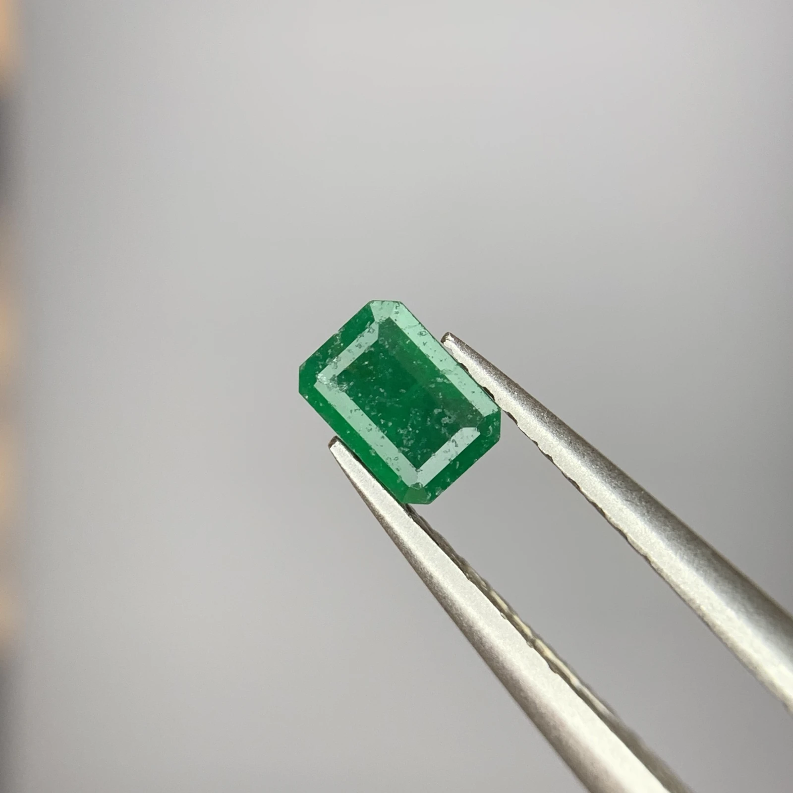 0.25 ct Natural Emerald loose gemstone octagon cut — view 3