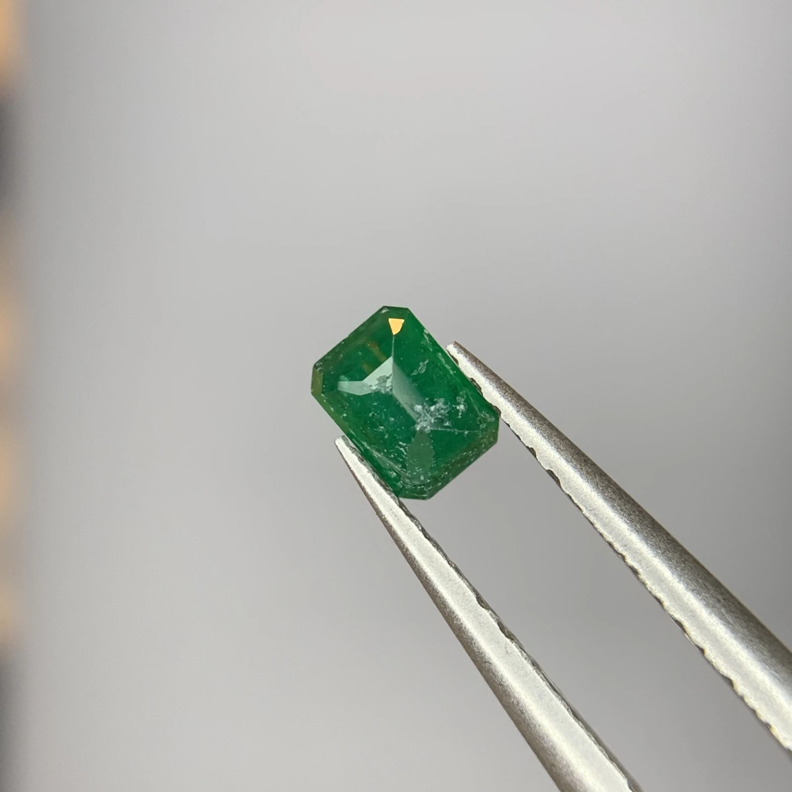 0.25 ct Natural Emerald loose gemstone octagon cut — view 4