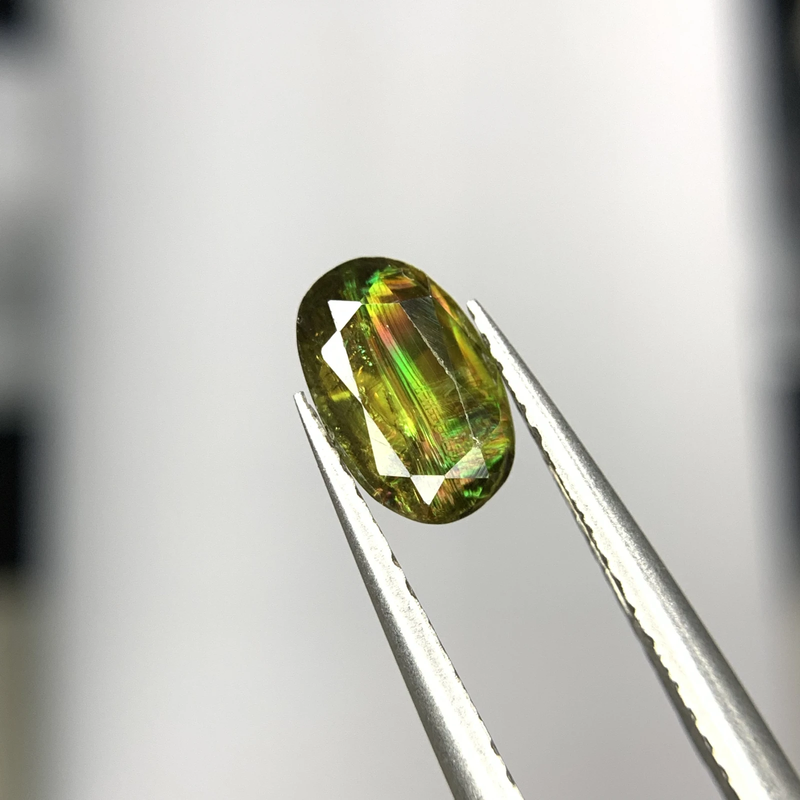 1.25ct Natural Sphene Titanite gemstone with horsetail oval shape — view 2