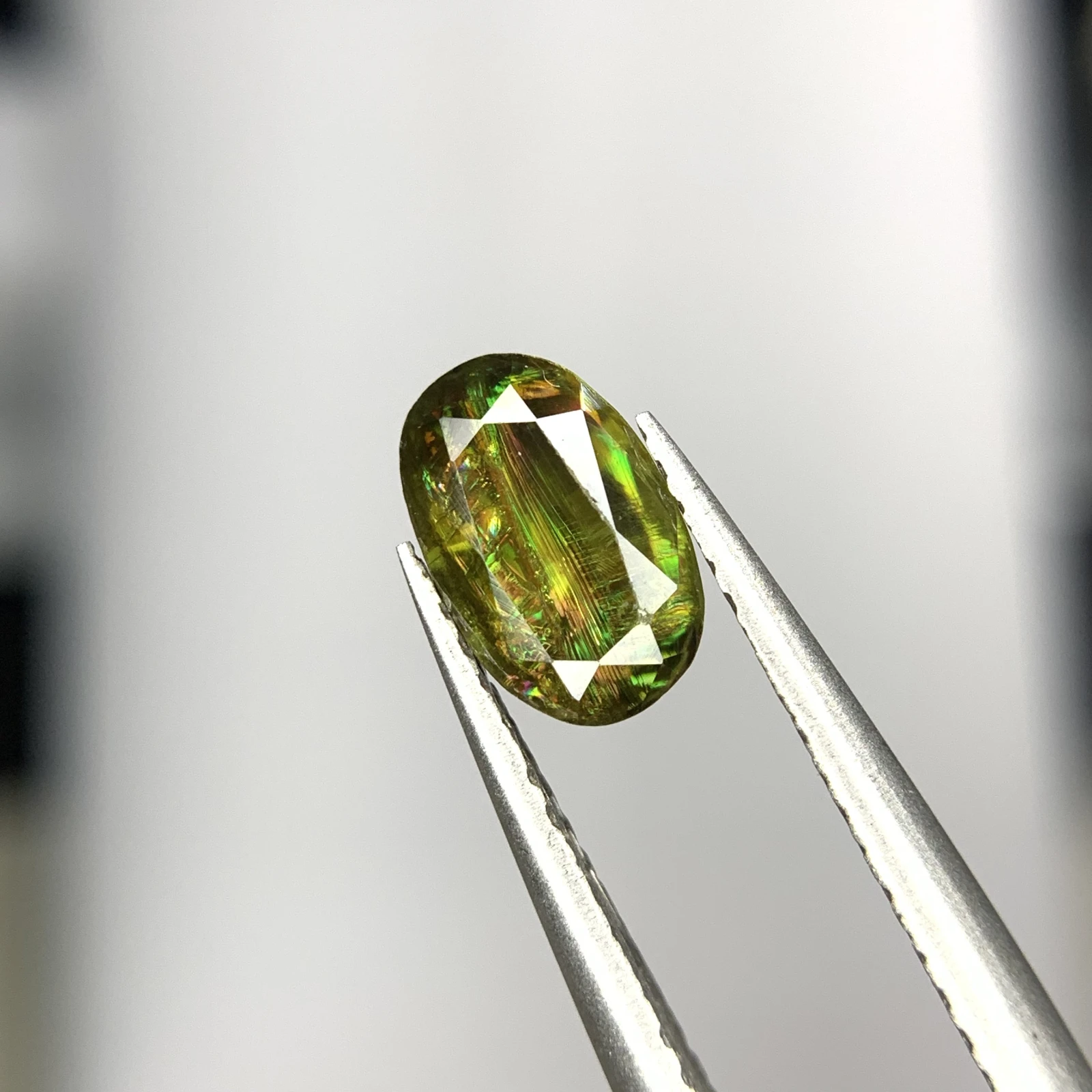 1.25ct Natural Sphene Titanite gemstone with horsetail oval shape — view 3