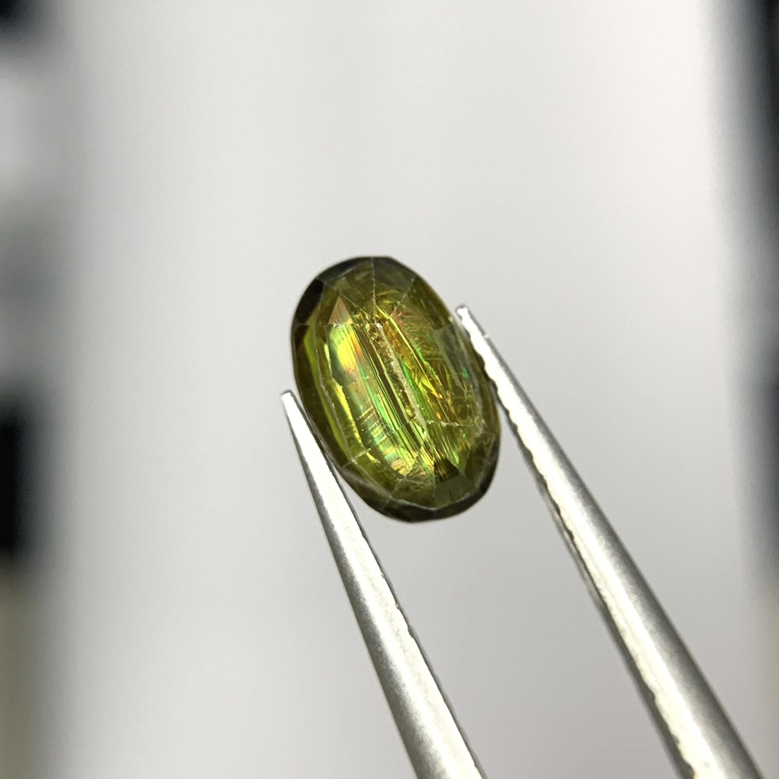 1.25ct Natural Sphene Titanite gemstone with horsetail oval shape — view 5