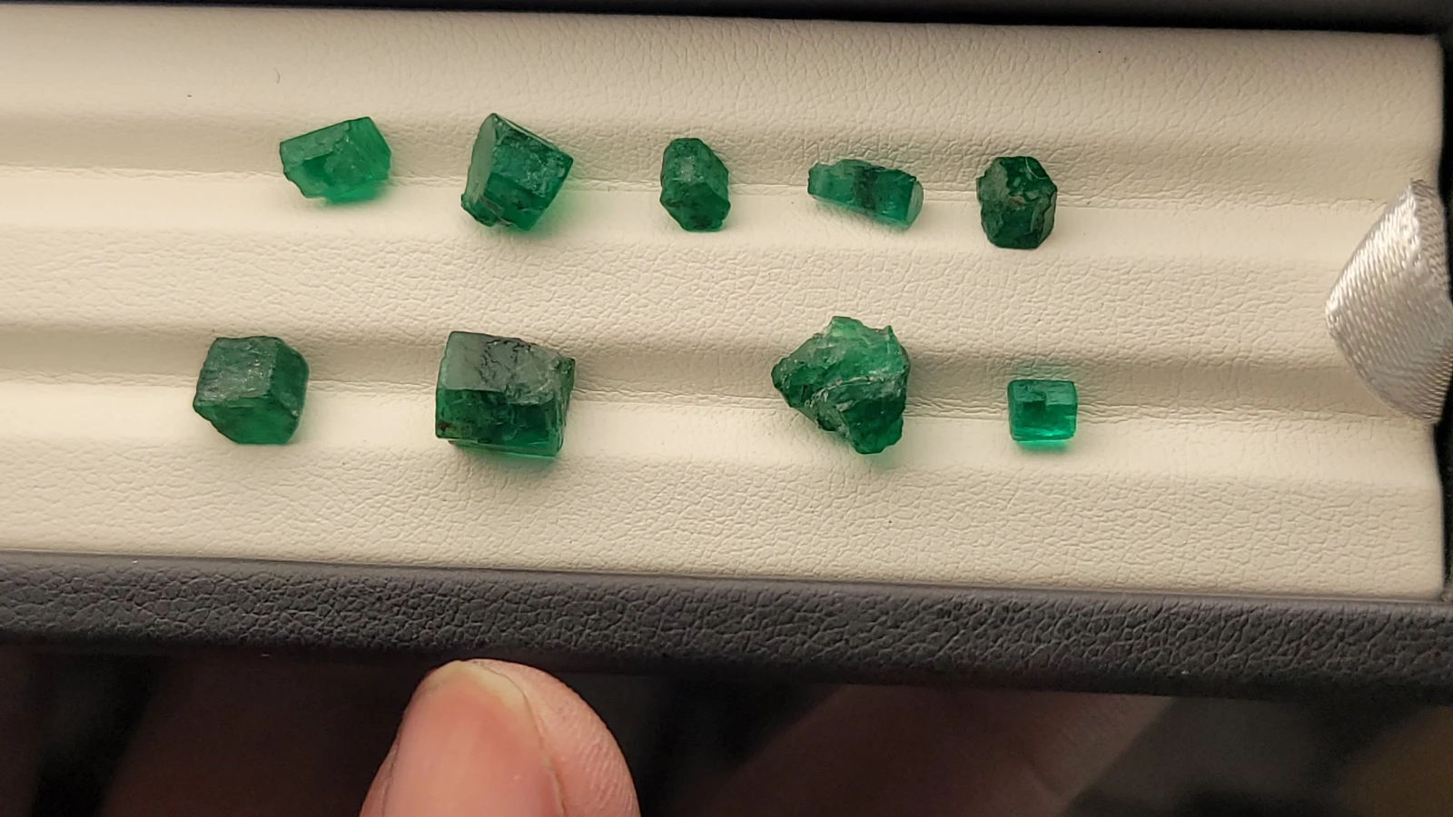 11.3ct Swat Emerald Rough Lot 9 pieces — view 1
